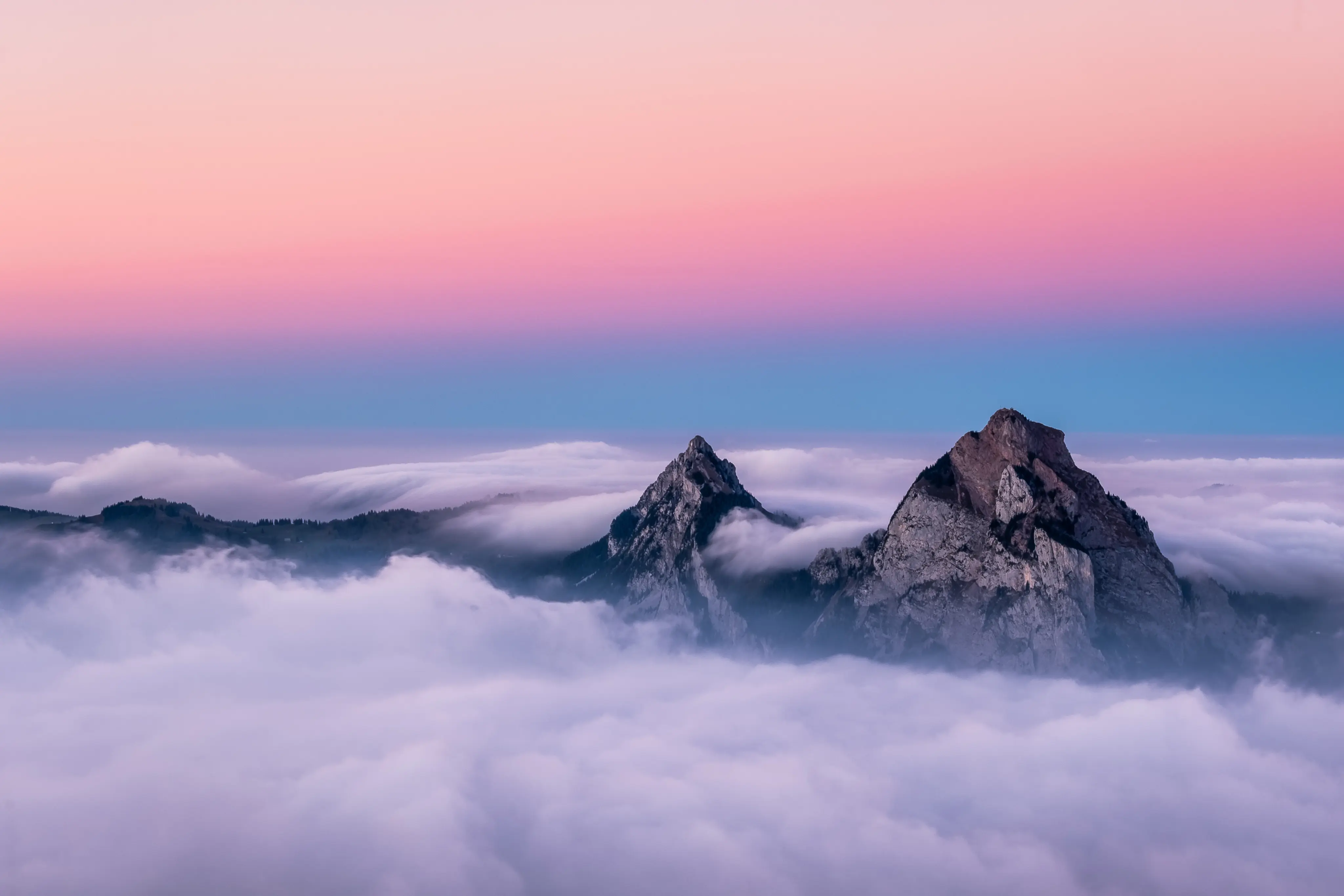 Mountain peaks above clouds